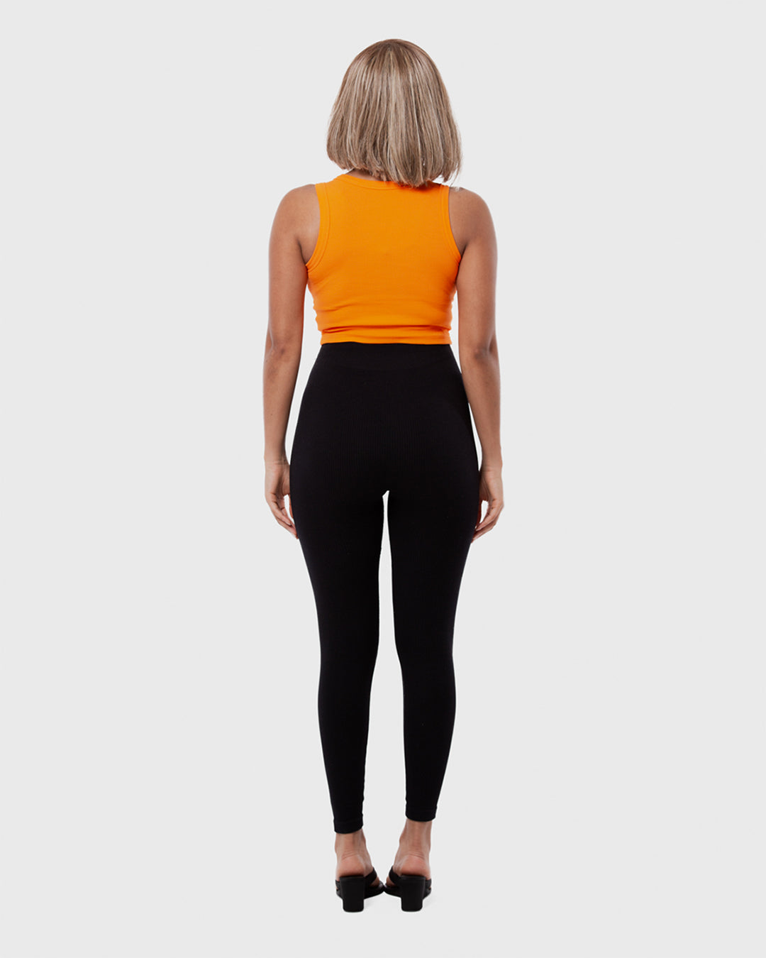 6. BAARA SS26 - ORANGE RHINESTONE TANK TOP