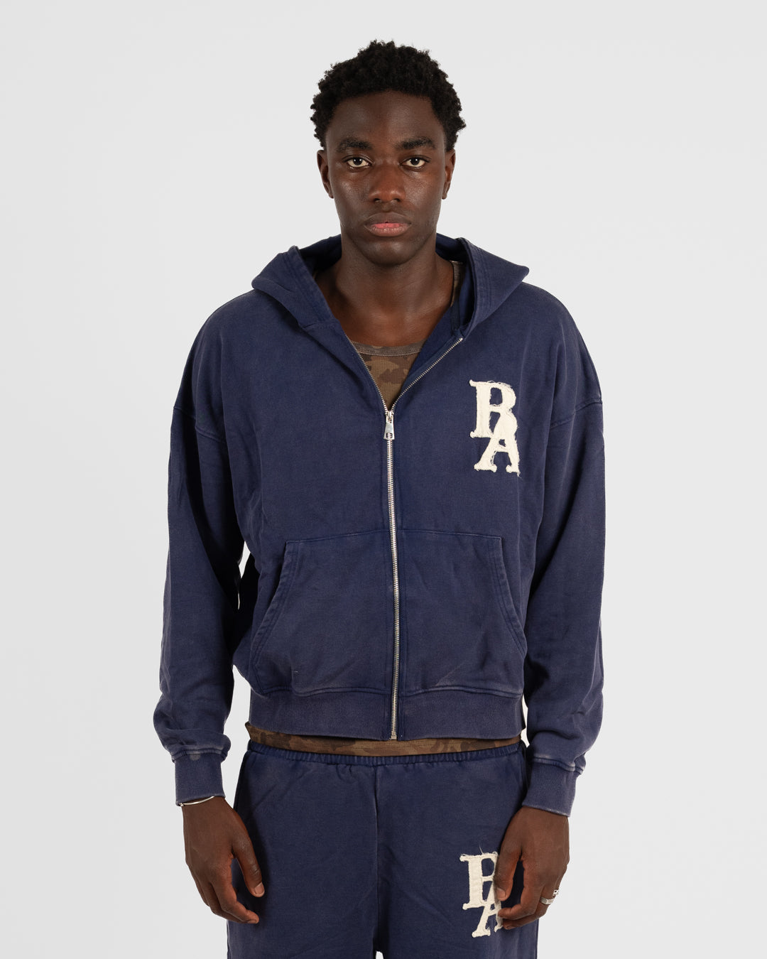 2. BAARA SS26 -   BLUE ZIP SWEAT-SHIRT