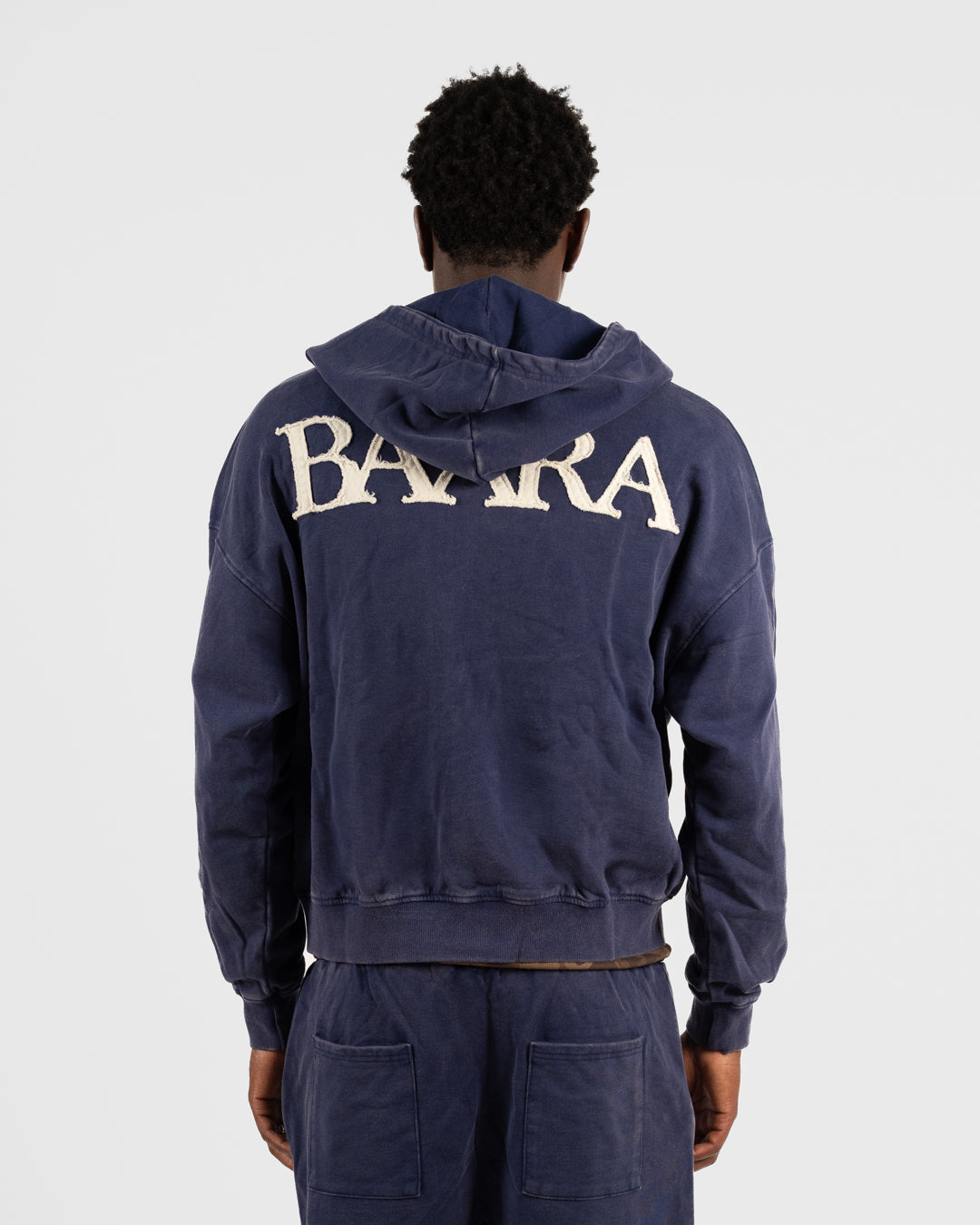 2. BAARA SS26 -   BLUE ZIP SWEAT-SHIRT