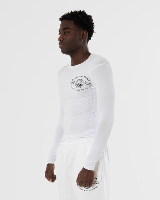 BAARA ATHLETICS SS26 - WHITE PERFORMANCE LONSLEEVE