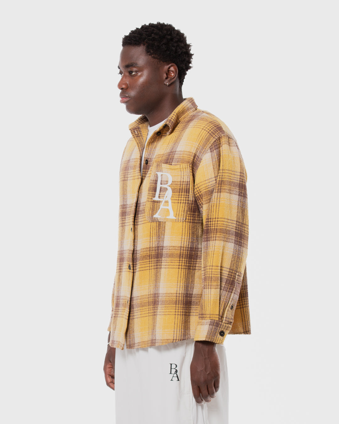 8. BAARA SS26 -  YELLOW STRIPPED SHIRT