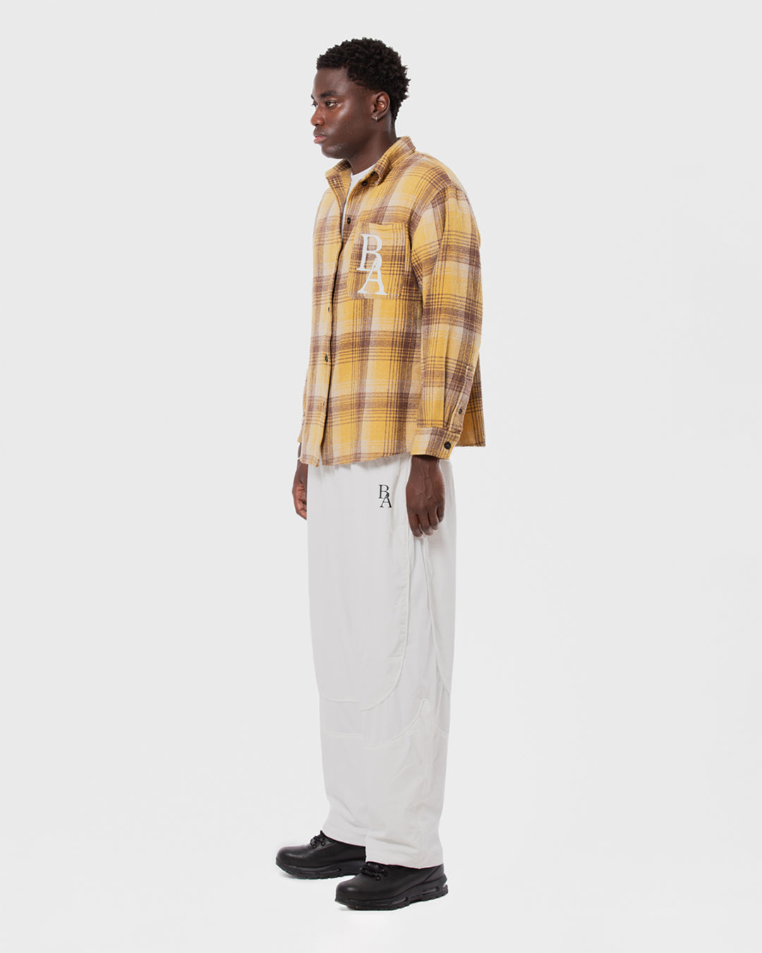 8. BAARA SS26 -  YELLOW STRIPPED SHIRT