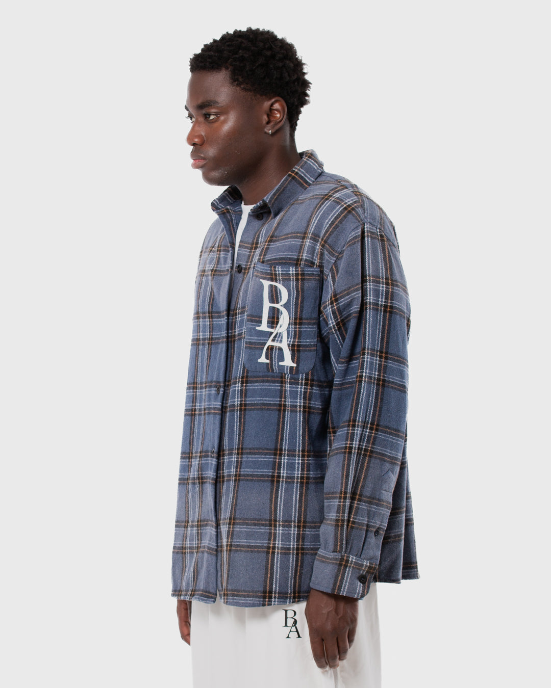 8. BAARA SS26 -  BLUE STRIPPED SHIRT