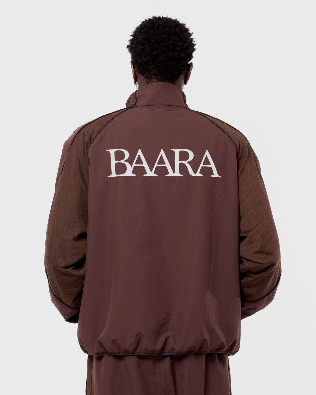 3. BAARA SS26 -  BROWN TRACKSUIT JACKET