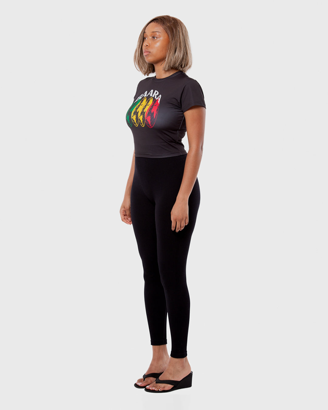 7. BAARA SS26 - BLACK WORLD BABY TOP