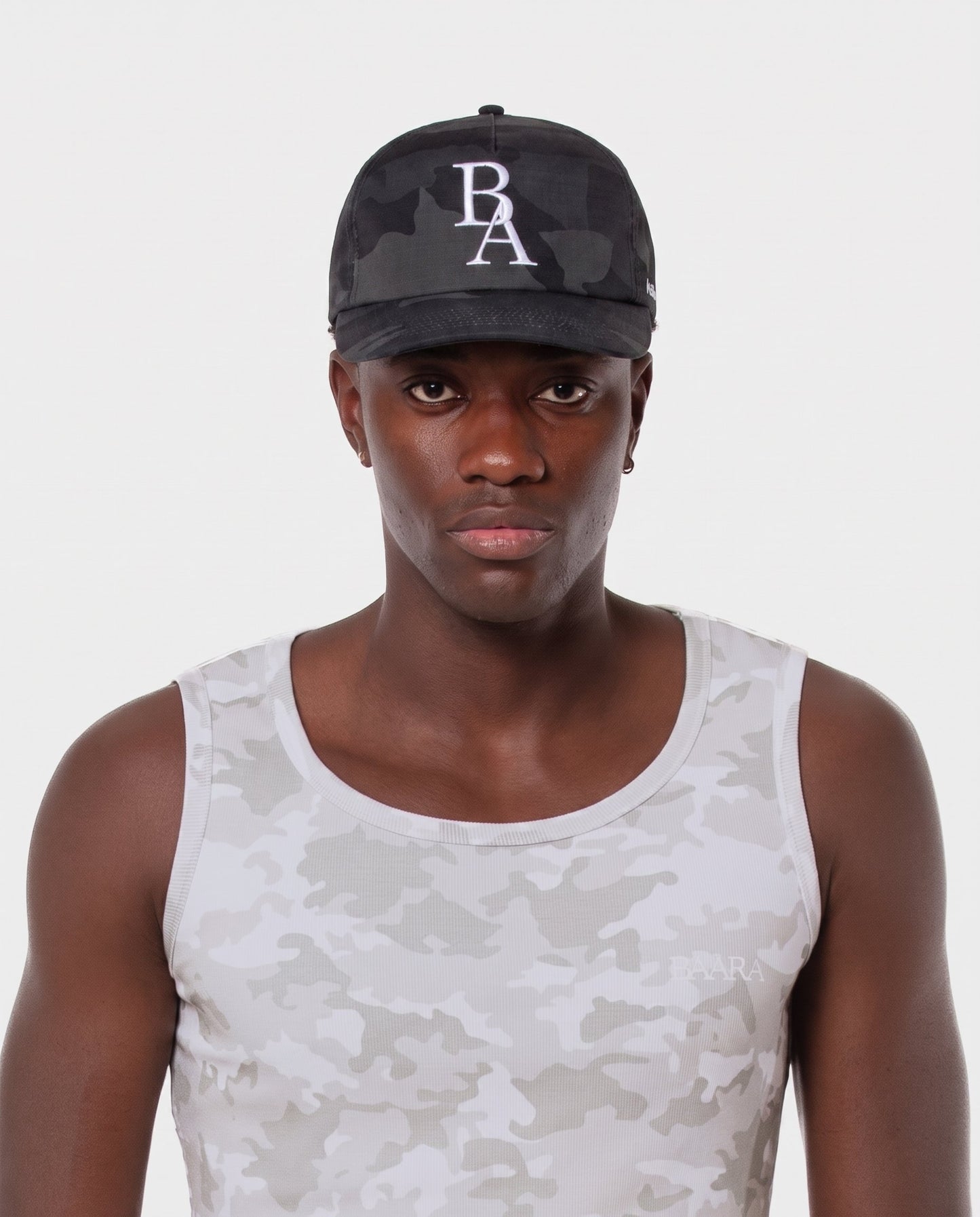 9. BAARA SS26 - BLACK CAMO HAT
