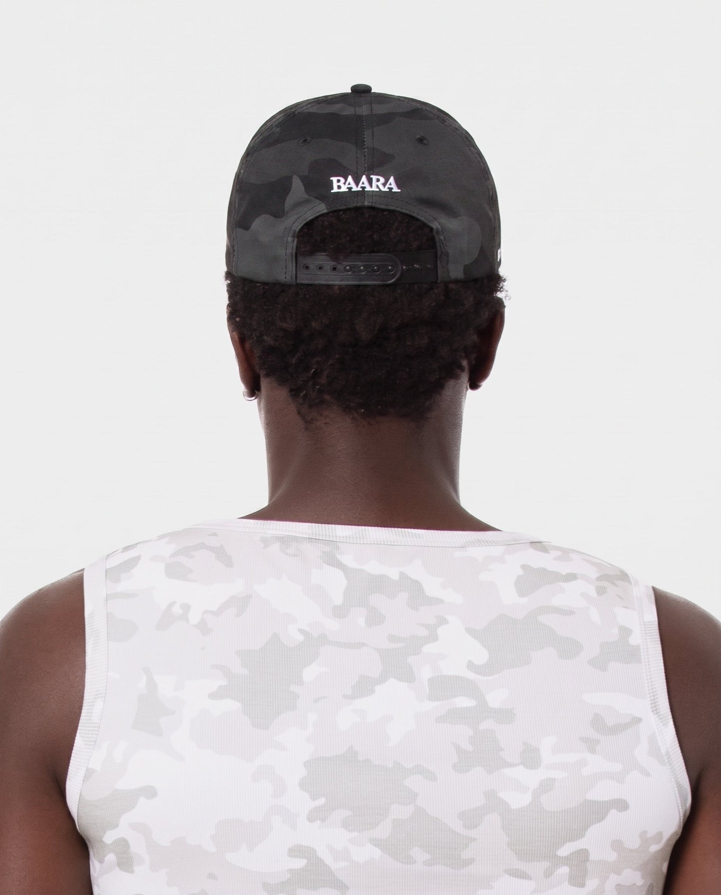 9. BAARA SS26 - BLACK CAMO HAT