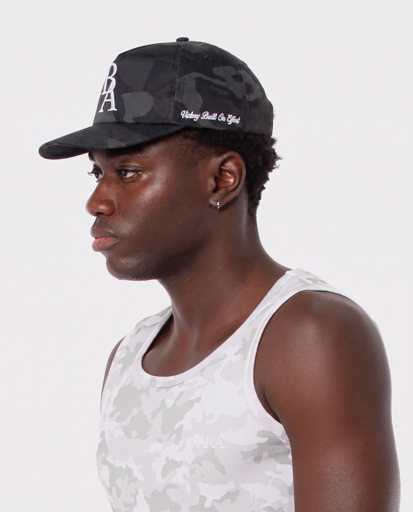 9. BAARA SS26 - BLACK CAMO HAT